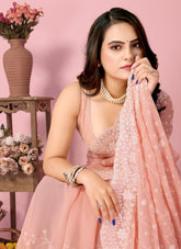 Peach colour saree looking frilly